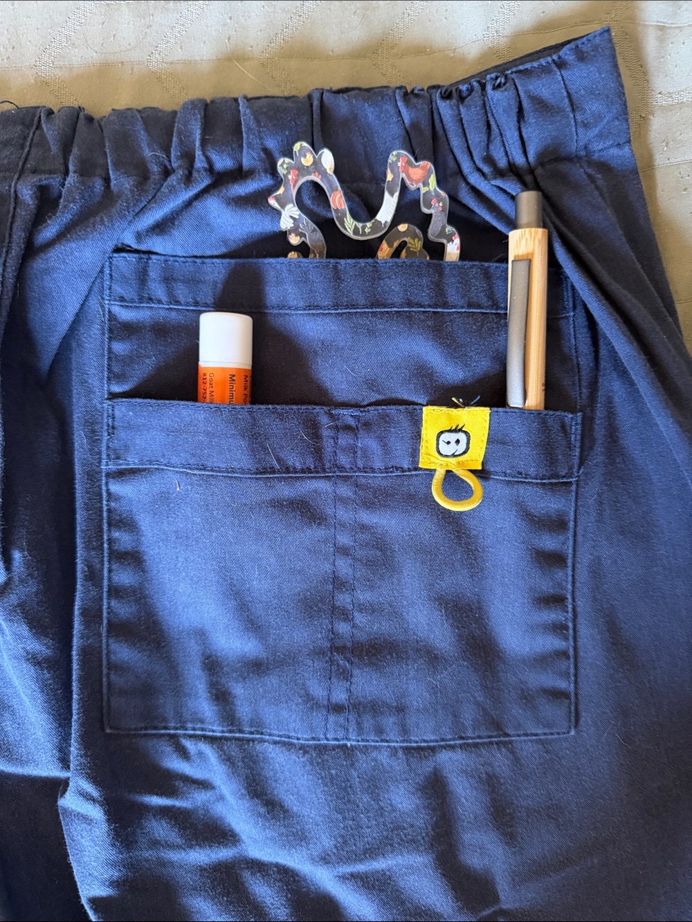 2 pair Wink Scrub Pants- Navy with Yellow Drawstring. Multiple pockets - Picture 4 of 9